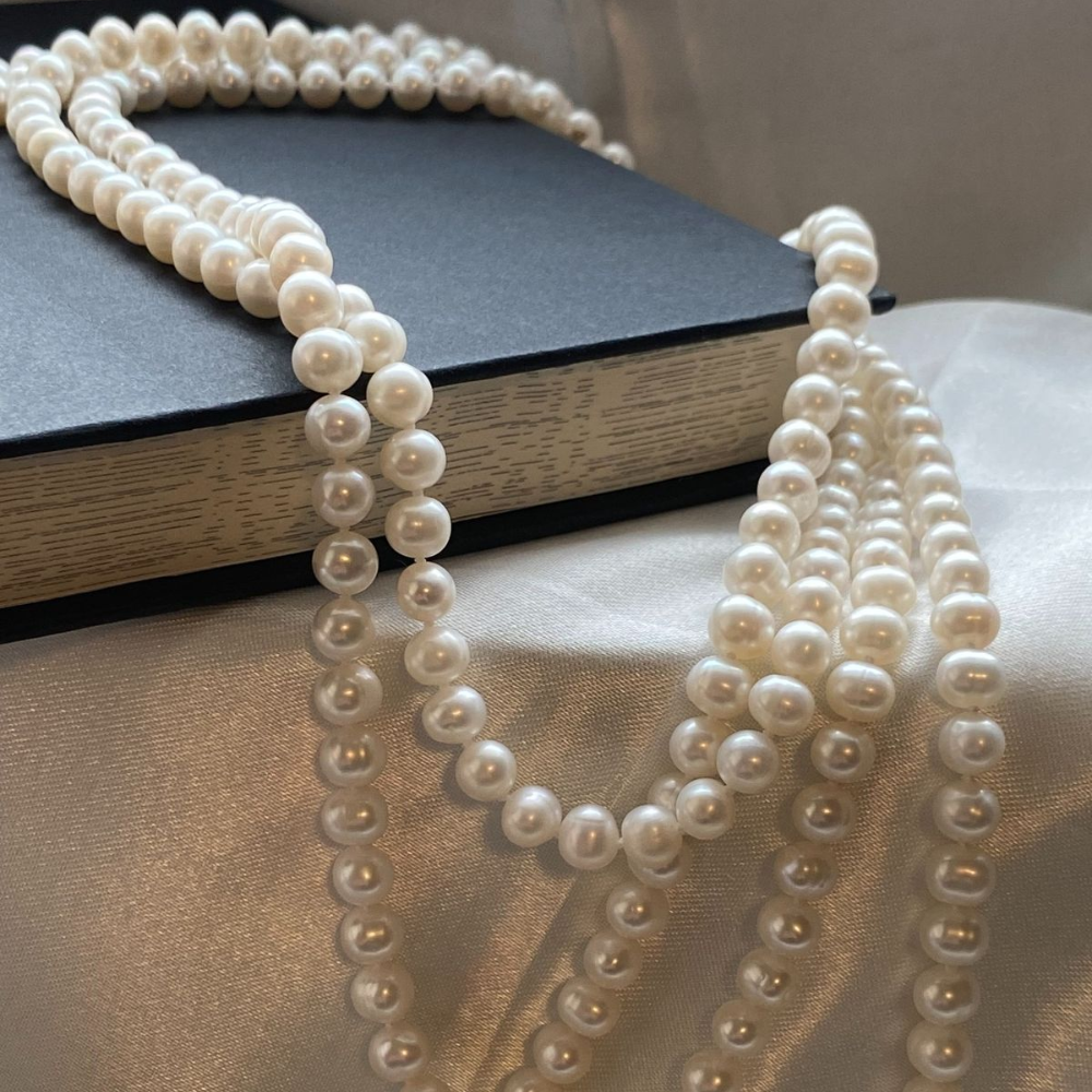 Lookbook Ngọc Trai: Bí Quyết Tỏa Sáng Cùng Váy Dạ Tiệc, Áo Dài Và Trang Phục Công Sở